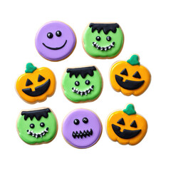 Fun assortment of monster and pumpkin Halloween cookies with spooky faces and bright frosting, perfect for parties on transparent background
