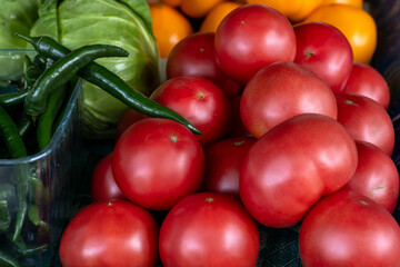 Ripe tomatoes on the market stall