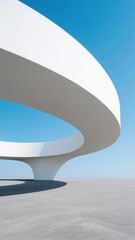 Modern Architectural Spiral Structure Against a Clear Blue Sky