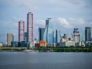 Seoul, South Korea - July.02.2025: Skyscrapers in Yeouido and Bamseom in the Han River in Seoul