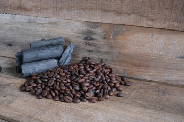 Coffee beans on a wooden background