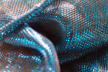 Shimmering Blue Sequin Fabric – Close-Up of Sparkling Metallic Texture with Reflective Dots for...