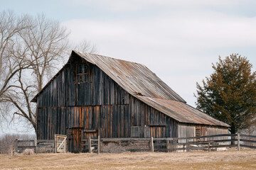 Fototapeta premium Old Timber-Framed Barn with Weathered Wood and Rustic Charm