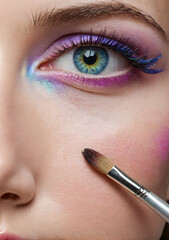 Naklejka premium woman applying makeup
