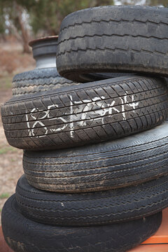 stack of old tyres for recycling / re-use