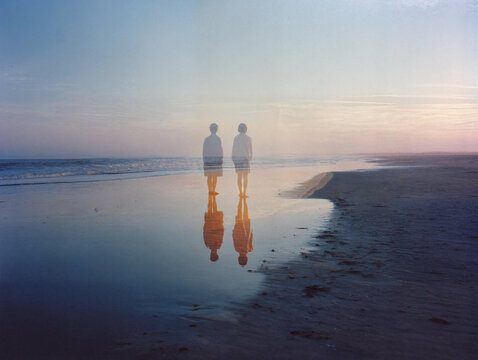 Dreamy Double Exposure of People on a Beach