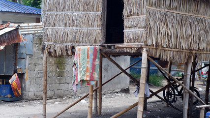 The basement of the stilt houses built by the Bajau people is built on the cluttered seashore of...