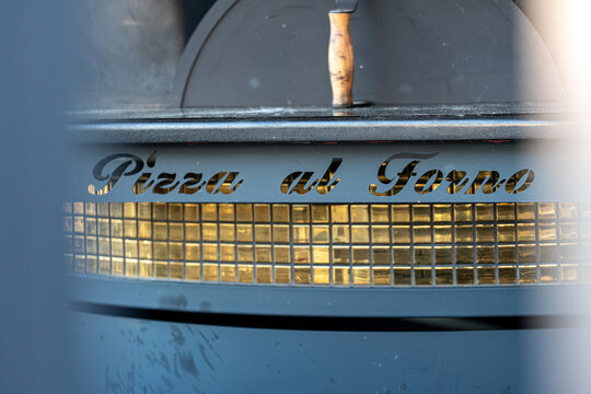 Pizza oven with fire, traditional baking, brick oven, cooking pizza
