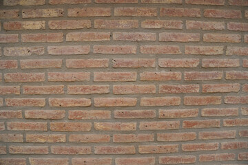 
Exposed brick wall with joints taken with uniform texture