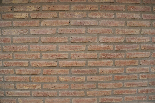 Fototapeta  Exposed brick wall with joints taken with uniform texture