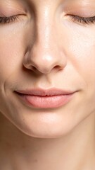 Closeup Woman Face with Peaceful Expression, Beauty, and Skin.