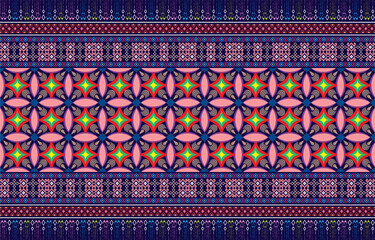 Mexican indian design with tribal ethnic themes on a geometric seamless background Beautiful textile print with native American tribal elements in an ethnic traditional style. Folk fashion from Mexico