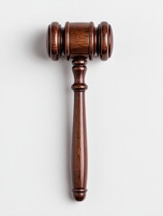 Wooden gavel resting on a white background, symbolizing justice and legal proceedings