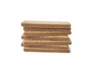 Pile of chocolate wafers isolated on white background 