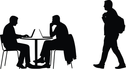Silhouette showing two seated individuals collaborating at a table while another figure walks away carrying a backpack
