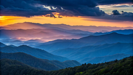 Dramatic mountain layers bathed in the warm glow of sunrise with dark stormy clouds above
