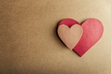 Two Paper Hearts on Brown Cardboard &ndash; Simple Minimalistic High-Resolution