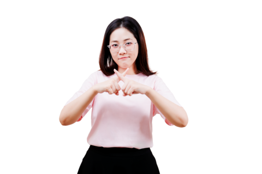 Asian young beautiful woman with glasses wearing a pink shirt gestures a cross with her fingers, expressing disapproval or refusal.