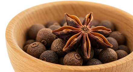 Star anise and allspice in wooden bowl isolated on transparent background