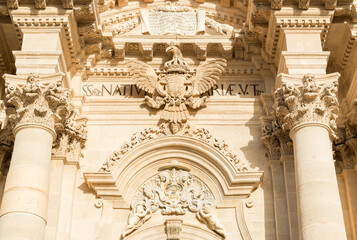 Obraz premium Detail of the facade of the Cathedral of Syracuse, located in the historic center on Ortygia Island, Sicily, Italy