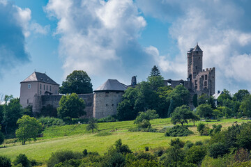 View of the idyllically situated ruins of Greifenstein Castle in the village of the same name in...