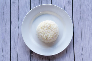 Steamed rice on white disc