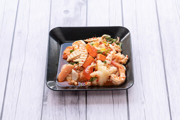 A spicy, sour, and salty meat salad.