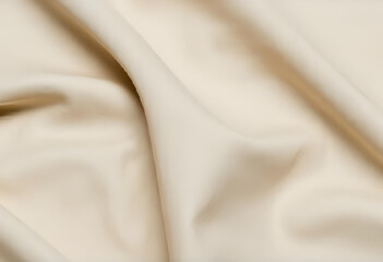 Close-up texture of wrinkled linen fabric in beige tones, captured in natural light with soft folds. Clean and elegant background for packaging, branding, or lifestyle visuals.