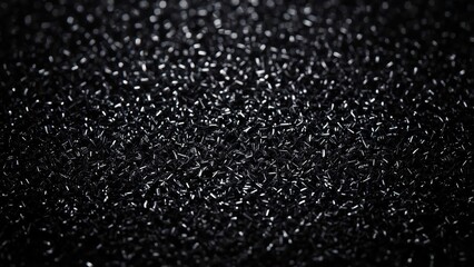 Texture of black glitter sparkle surface with shiny bokeh lights effect perfect for festive background, celebration, luxury design, party, holiday decoration, elegant dark mood