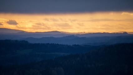Majestic Sunrise Over Misty Mountain Ranges