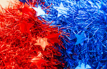 blue and red decorations glisten stars isolated on white for Independence Day or celebrate July 4th.