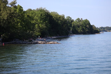 Landscape view of lake and beach, photo was taken from Rough Hill, Toronto. The photo was taken in...