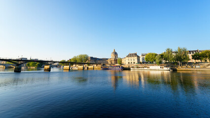 Pont des Arts bridge and Seine river quay in Paris city