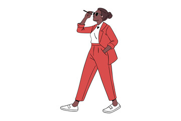 Stylish woman in a red suit and sunglasses confidently adjusts her eyewear while posing with her hand in her pocket