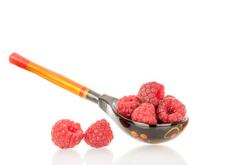 Fresh sweet raspberries isolated on white background, macro.	
