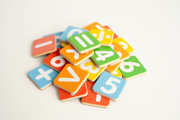Number wood block cubes for learning Mathematic, education math concept.