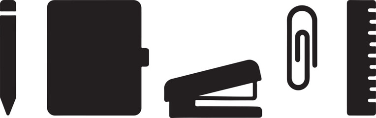 notebook with black screens alongside a stapler and other office equipment