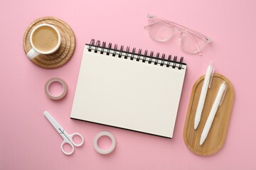 Flat lay composition with notebook on pink background