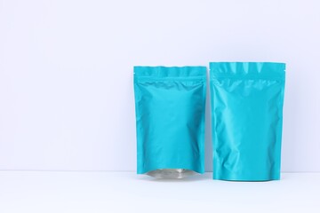 Zipper stand-up pouches on white background. Mockup for design