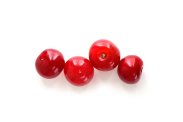 Many fresh ripe cherries isolated on white, top view