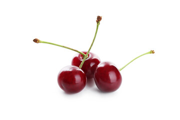 Three fresh ripe cherries isolated on white