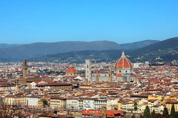 Fototapeta premium Panoramic of City of Florence in Central Italy with many famous historic buildings and Palace and Cathedral
