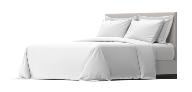 A comfortable and cozy bed is neatly made with crisp, clean white linens, pillows, and a soft, inviting duvet