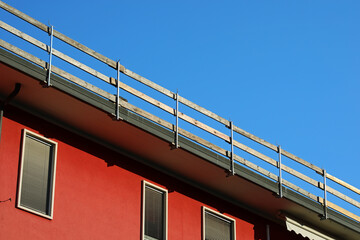 wooden planks of the sturdy protective barrier firmly installed for the safety of workers to...