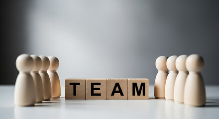 Wooden figures and blocks spelling team collaboration unity