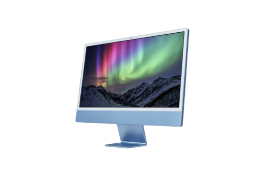 Modern computer monitor displaying a vibrant aurora borealis over snow capped mountains