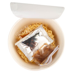 Instant noodle cup top view plastic fork white background