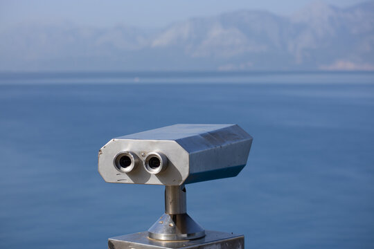 coin operated binoculars on the beach