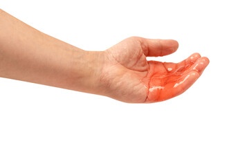 Red slime toy in man hand isolated on white.