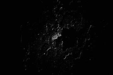 Speckled Rough plastering grunge wall. Shabby grainy noise dusted vintage abstract structure. Grungy surface. Retro gritty effect overlay. Black background